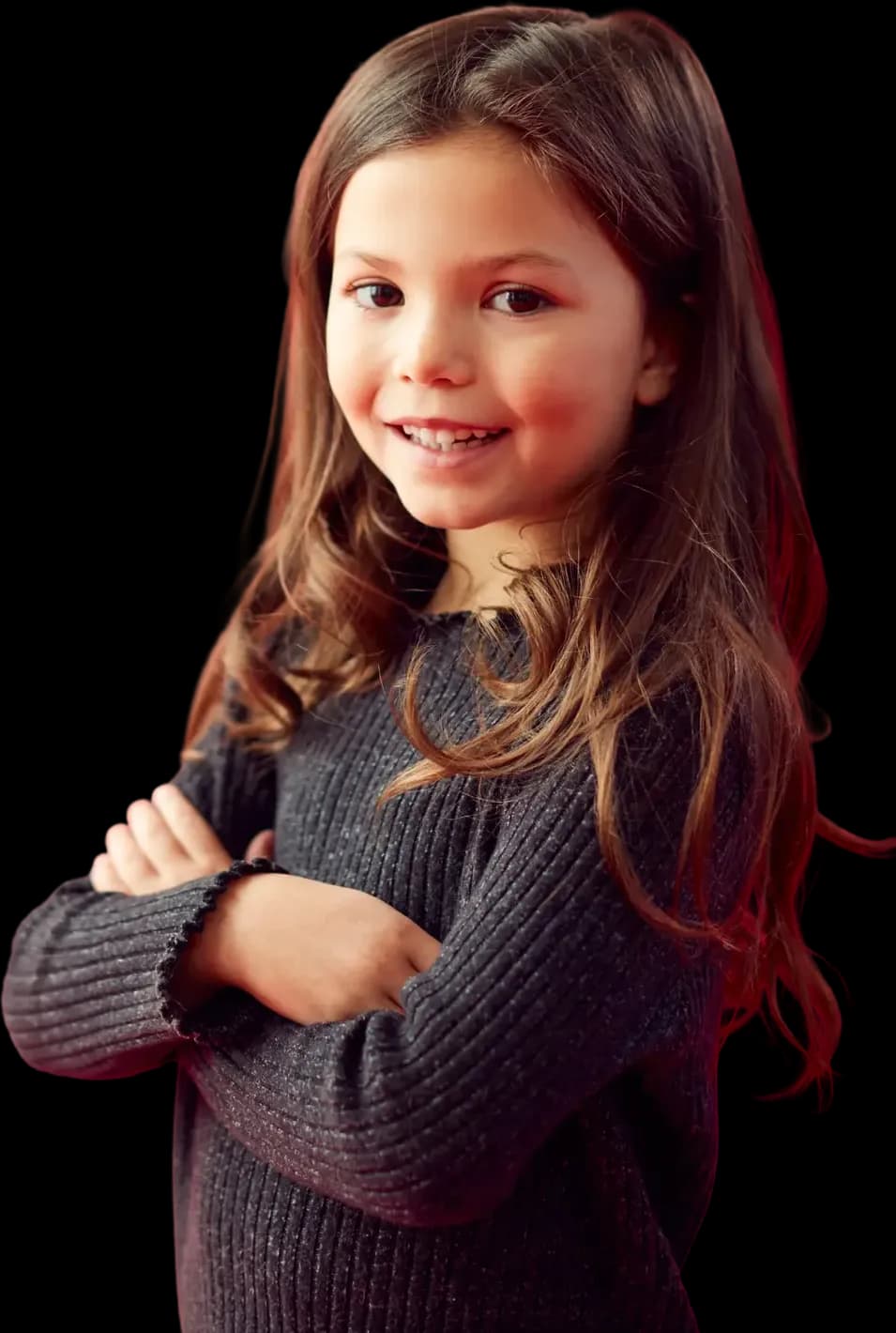 Smiling girl with her arms crossed
