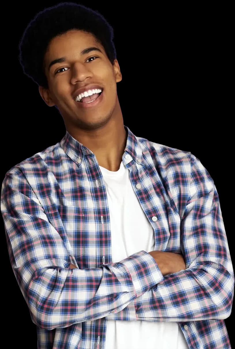 Smiling teenage boy in a checked shirt