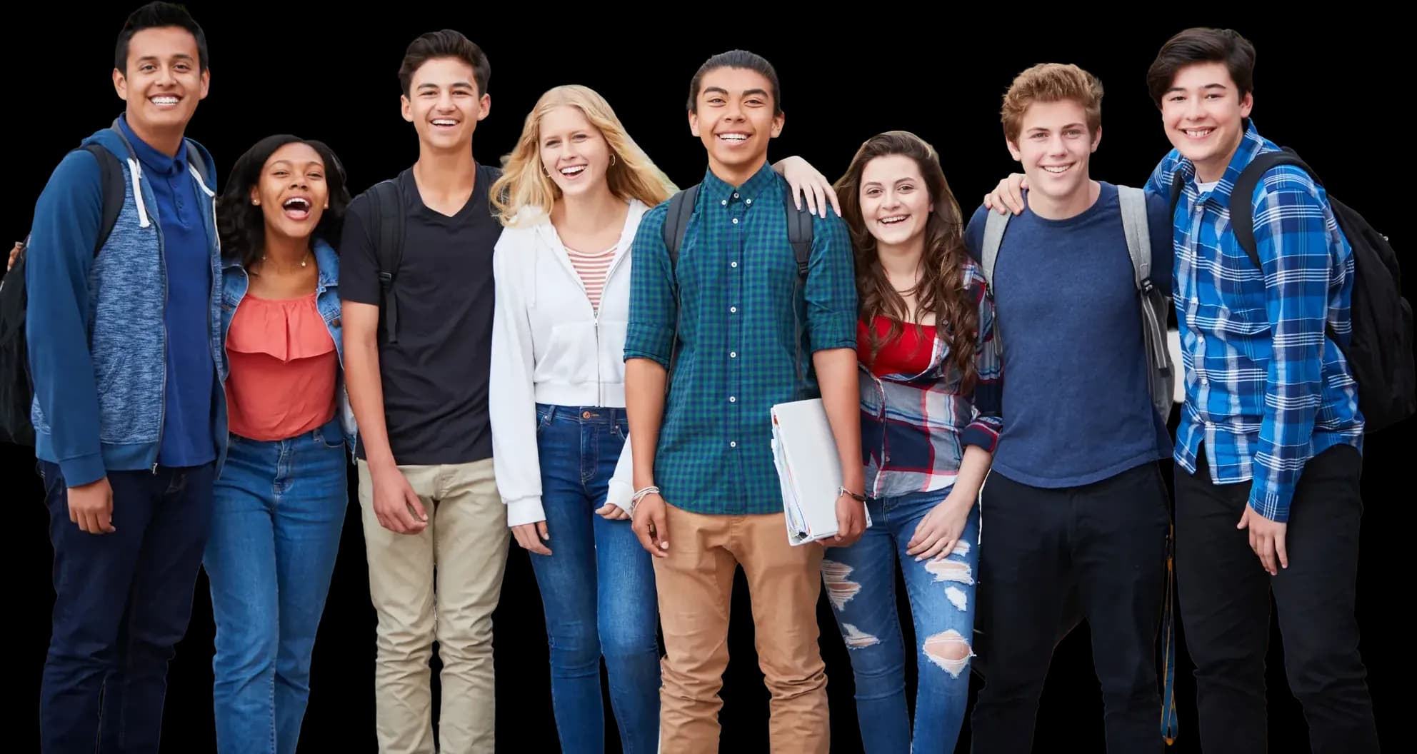 Group of smiling teenagers with backpacks standing together